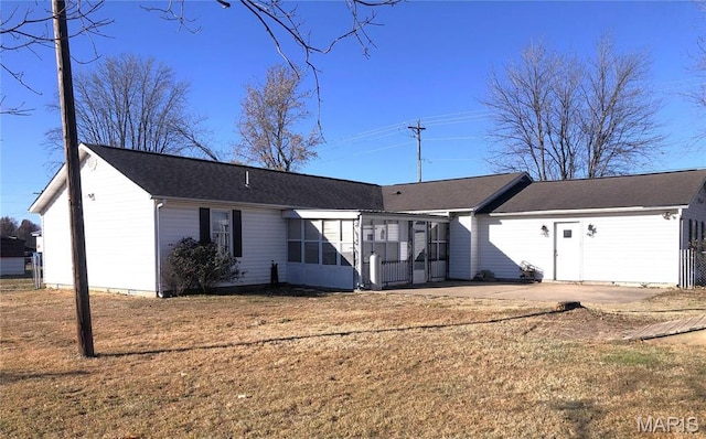 1210 N Prairie, Bloomfield, MO 63825 - back of house with a sunroom