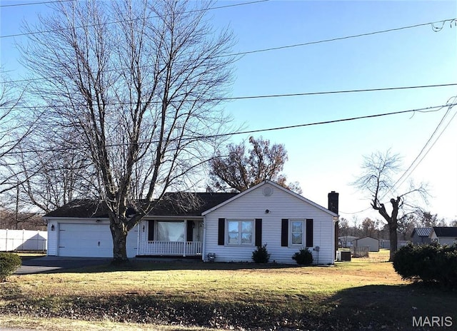 1210 N Prairie, Bloomfield, MO 63825 - ranch-style house with an attached garage, a chimney, a front lawn, and central AC