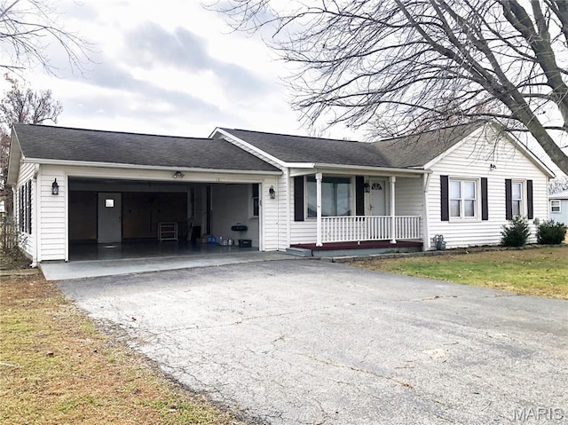 1210 N Prairie, Bloomfield, MO 63825 - ranch-style home with a porch, asphalt driveway, a garage, and a shingled roof