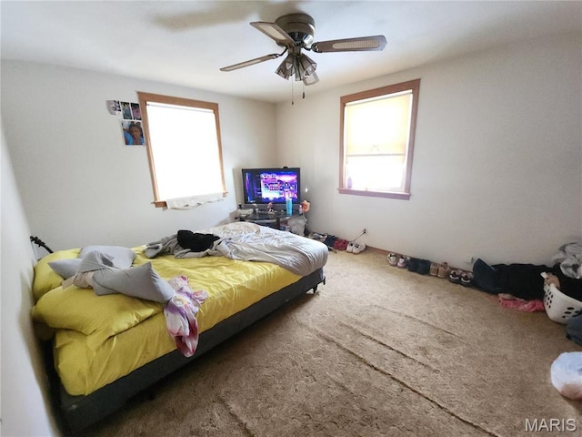 1238 Hoyt Dr, Saint Louis, MO 63137 - carpeted bedroom featuring a ceiling fan
