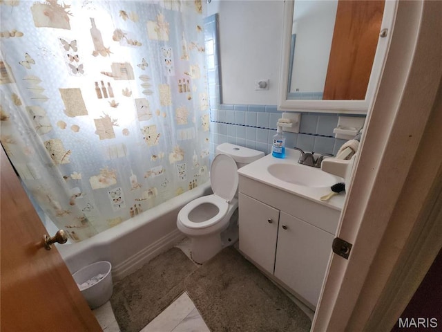 1238 Hoyt Dr, Saint Louis, MO 63137 - full bath featuring vanity, shower / bath combination with curtain, toilet, tile walls, and wainscoting