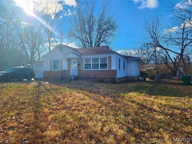 1238 Hoyt Dr, Saint Louis, MO 63137 - view of front of house with a garage