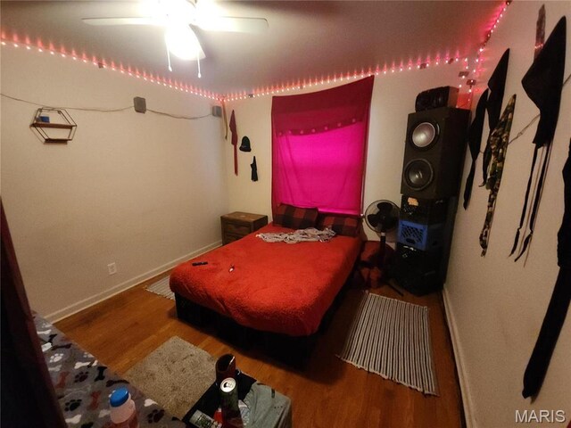 9409 Aetna Dr, Saint Louis, MO 63137 - bedroom with wood finished floors, baseboards, and a ceiling fan
