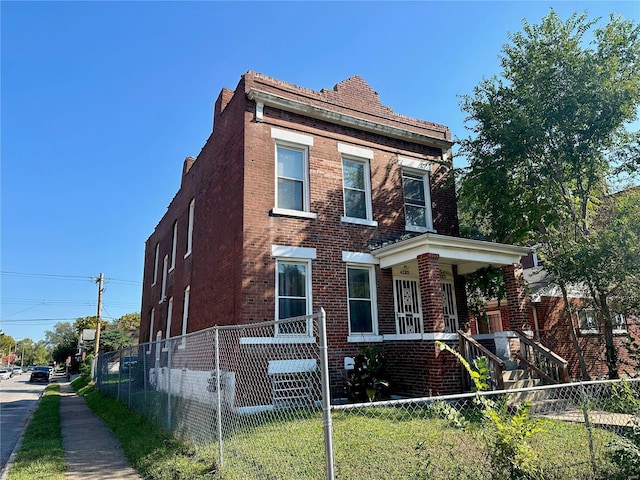 4123 Labadie Ave, Saint Louis, MO 63115 - view of home's exterior with brick siding and a porch