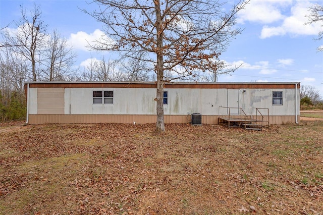 back of property with central air condition unit