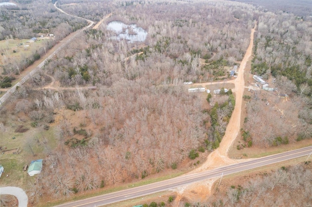 aerial overview of property's location with a forest