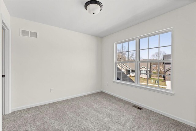 614 Tull Ct, Wentzville, MO 63385 - carpeted spare room with baseboards