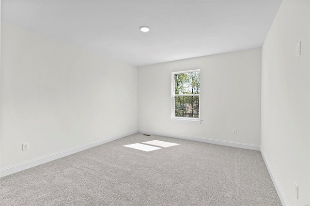 409 Fleming Cir, Wentzville, MO 63385 - carpeted spare room with baseboards