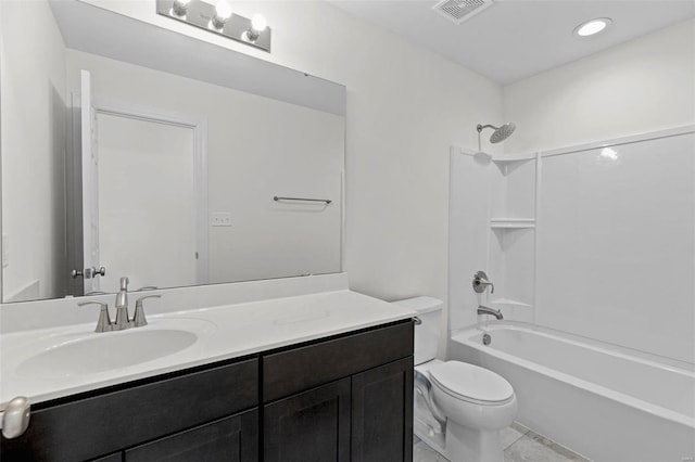 409 Fleming Cir, Wentzville, MO 63385 - bathroom featuring toilet, vanity, and washtub / shower combination