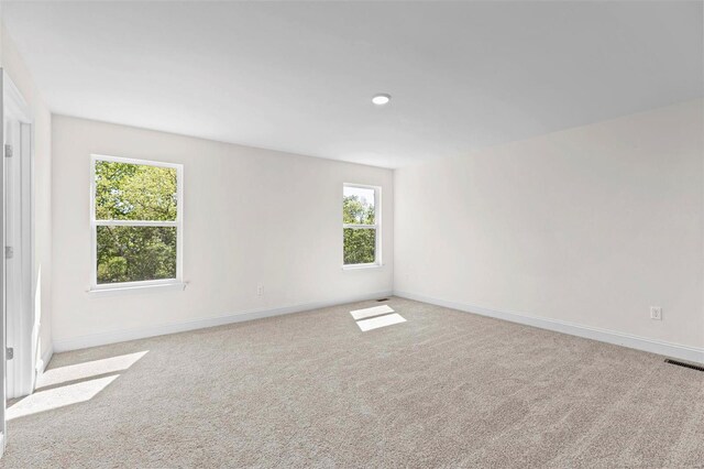 409 Fleming Cir, Wentzville, MO 63385 - empty room with carpet flooring and baseboards