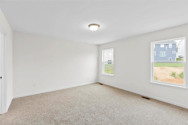 411 Fleming Cir, Wentzville, MO 63385 - empty room featuring carpet and baseboards