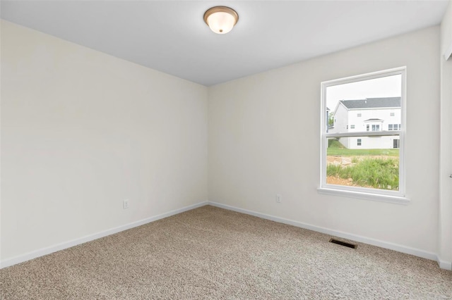 411 Fleming Cir, Wentzville, MO 63385 - spare room with carpet floors and baseboards