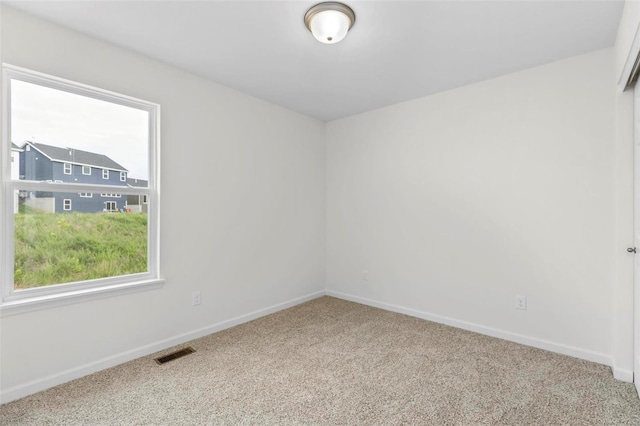 411 Fleming Cir, Wentzville, MO 63385 - carpeted empty room with baseboards