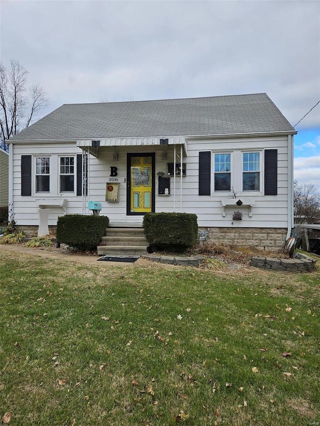 3506 Ohio St, Alton, IL 62002 - view of front facade featuring a front yard and roof with shingles