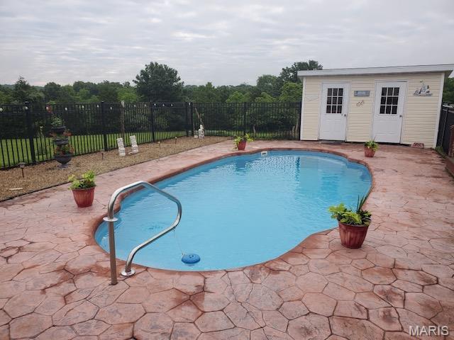 10740 Wilmena Ln, Rolla, MO 65401 - view of swimming pool with a fenced backyard and a patio