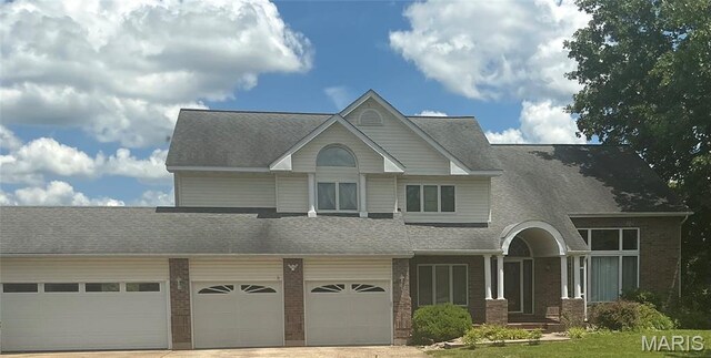 10740 Wilmena Ln, Rolla, MO 65401 - view of front of property featuring brick siding, driveway, and a shingled roof