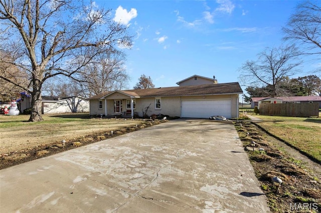 216 Sherrie Dr, Sikeston, MO 63801 - view of front of home featuring driveway and a garage
