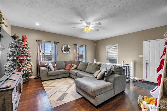 216 Sherrie Dr, Sikeston, MO 63801 - living area with wood finished floors, ceiling fan, a textured ceiling, and recessed lighting
