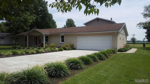 216 Sherrie Dr, Sikeston, MO 63801 - ranch-style house featuring a front lawn, a garage, driveway, and brick siding
