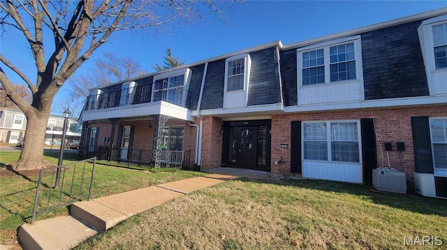 1674 Blue Ridge Dr Unit A, Saint Louis, MO 63125 - multi unit property with brick siding, mansard roof, and a shingled roof