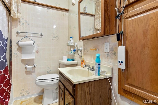 445 Jerome Ln, Cahokia, IL 62206 - full bath with toilet, vanity, and tile walls