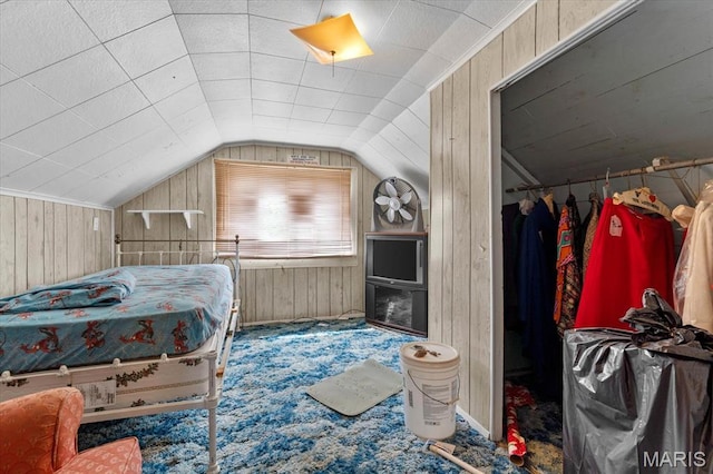 445 Jerome Ln, Cahokia, IL 62206 - carpeted bedroom featuring wood walls and vaulted ceiling