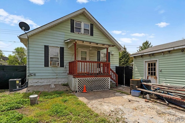 445 Jerome Ln, Cahokia, IL 62206 - view of front of home featuring covered porch, central AC unit, fence, and cooling unit