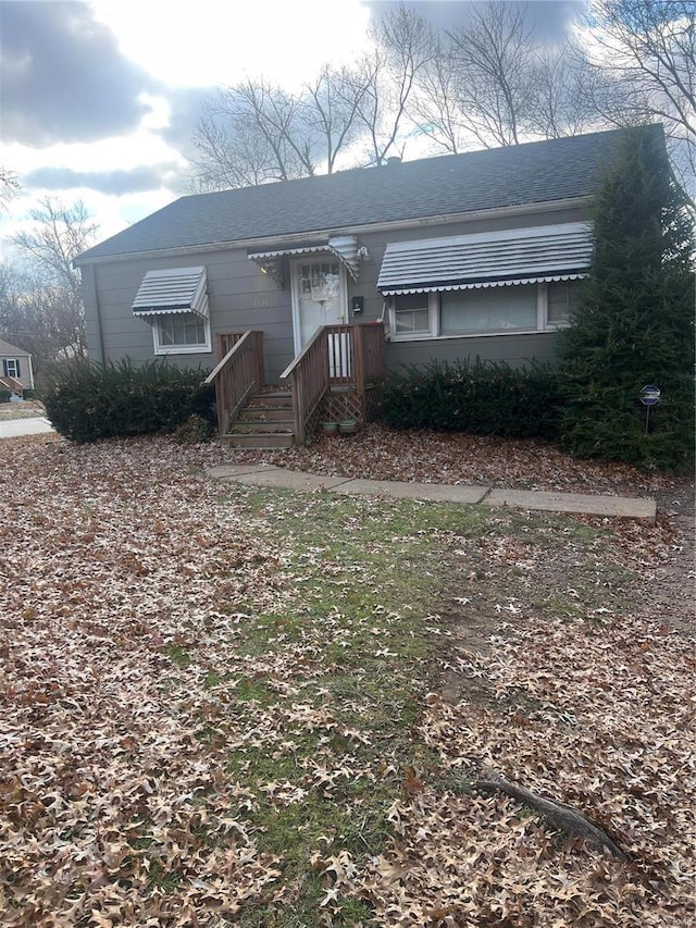 1901 Falcon Dr, Saint Louis, MO 63133 - view of front of house with roof with shingles