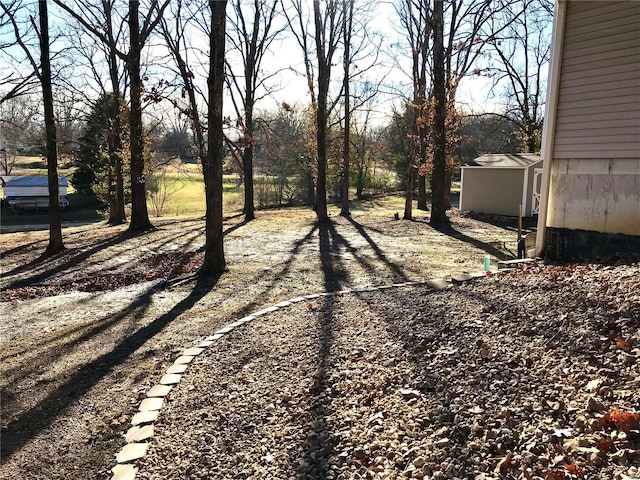 1578 Lakeshore, Cuba, MO 65453 - view of yard with a storage unit and an outdoor structure