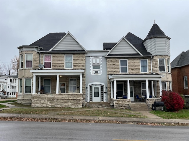 221 N 3rd St Unit 221, Louisiana, MO 63353 - view of front of property with covered porch and stone siding