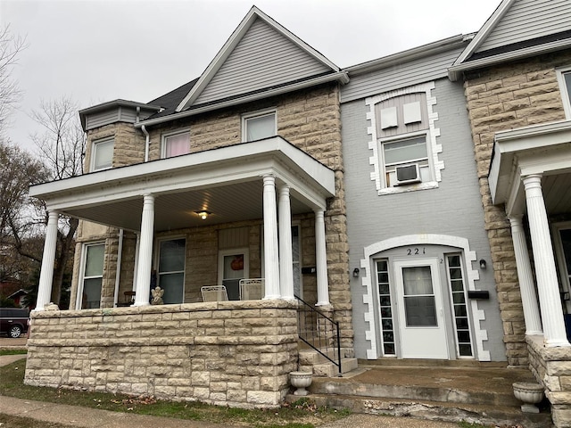 221 N 3rd St Unit 221, Louisiana, MO 63353 - view of front of home with covered porch and stone siding