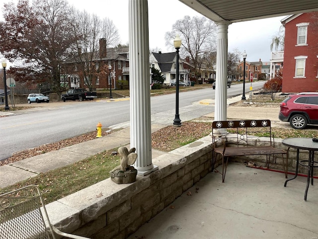 221 N 3rd St Unit 221, Louisiana, MO 63353 - view of patio / terrace featuring covered porch and a residential view