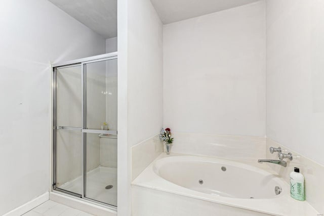 13101 Mill Crossing Ct Unit 307, Creve Coeur, MO 63141 - bathroom featuring a shower stall and a tub with jets