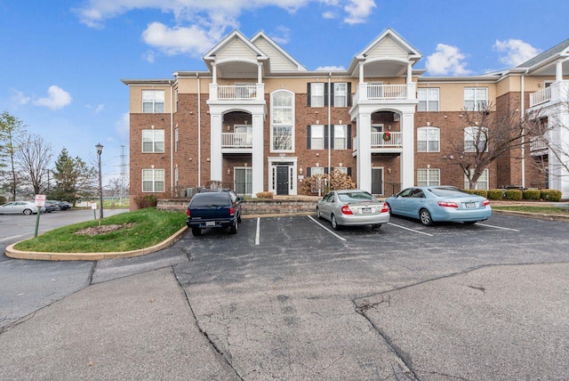 13101 Mill Crossing Ct Unit 307, Creve Coeur, MO 63141 - view of building exterior featuring uncovered parking