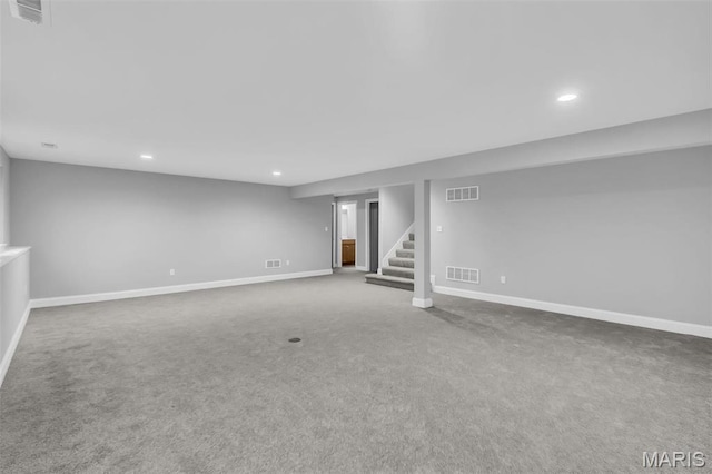 201 Keaton Woods Dr, Ofallon, MO 63368 - finished basement featuring stairs, carpet flooring, recessed lighting, and baseboards