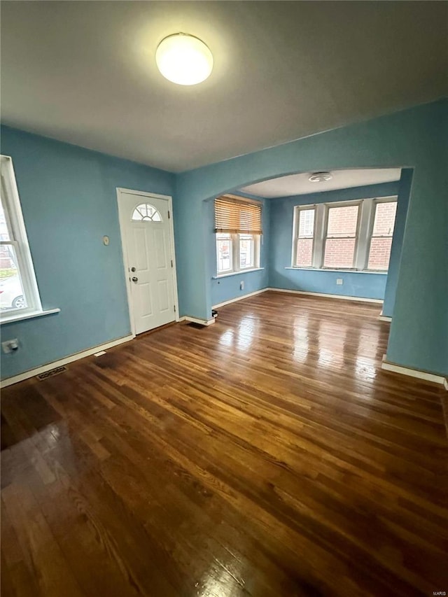 4025 Tholozan Ave, Saint Louis, MO 63116 - foyer entrance with dark wood finished floors and baseboards