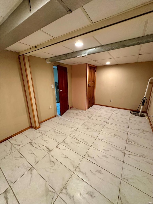 4025 Tholozan Ave, Saint Louis, MO 63116 - finished below grade area with light marble finish flooring and baseboards