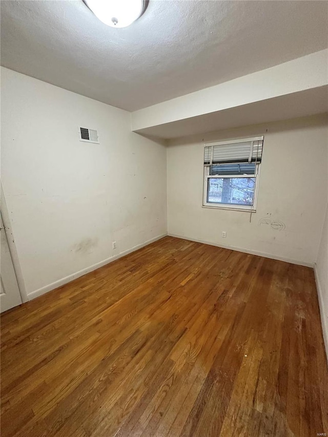 4828 Reavis Barracks Rd, Saint Louis, MO 63123 - unfurnished room with hardwood / wood-style flooring and baseboards