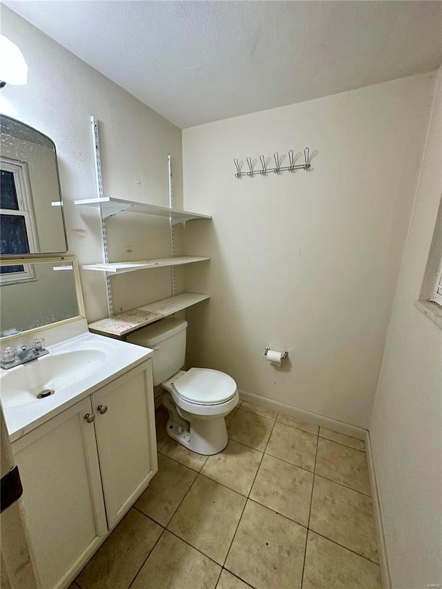 4828 Reavis Barracks Rd, Saint Louis, MO 63123 - bathroom featuring toilet, tile patterned flooring, and vanity