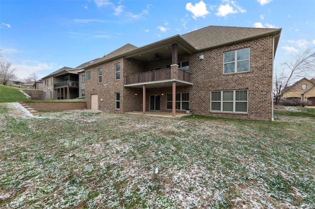 1661 Helmsdale Cpe, Girardeau, MO 63701 - back of property featuring a balcony, ceiling fan, brick siding, and a patio area