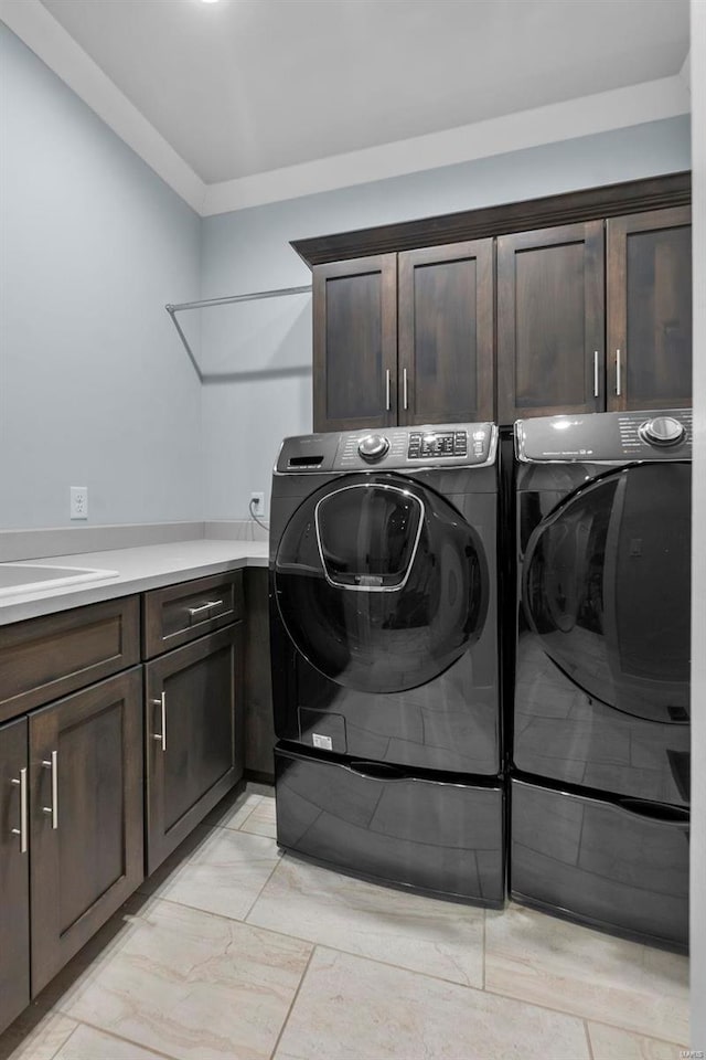 1661 Helmsdale Cpe, Girardeau, MO 63701 - washroom with cabinet space, separate washer and dryer, and light marble finish floors