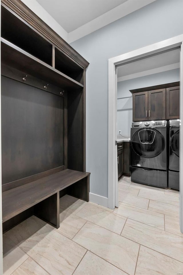 1661 Helmsdale Cpe, Girardeau, MO 63701 - mudroom with washer and dryer and baseboards