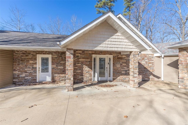 14178 E US Highway 60, Van Buren, MO 63965 - doorway to property featuring a shingled roof and brick siding
