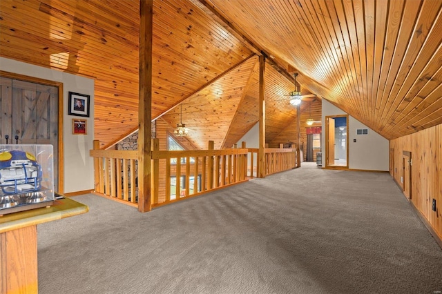 7467 Walshville Trl, Hillsboro, IL 62049 - bonus room with a ceiling fan, wooden ceiling, vaulted ceiling, carpet floors, and wooden walls