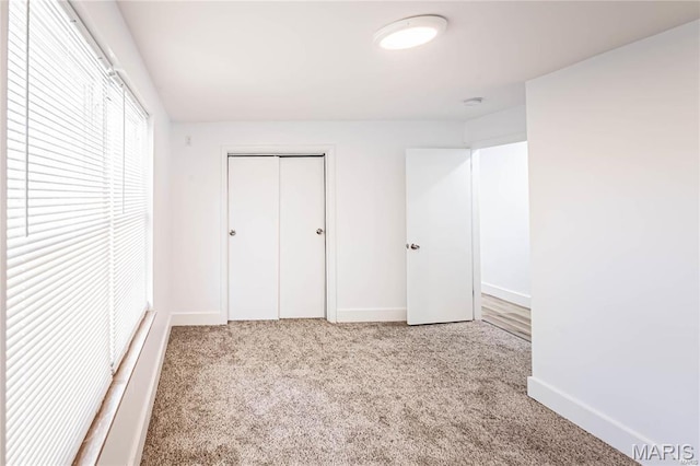1101 W Parkedge Ln, Saint Louis, MO 63130 - unfurnished bedroom with carpet flooring and a closet