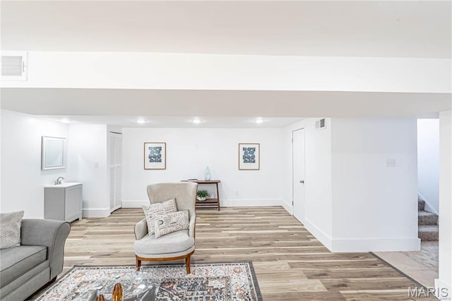 1101 W Parkedge Ln, Saint Louis, MO 63130 - living area with recessed lighting, stairway, and light wood-type flooring