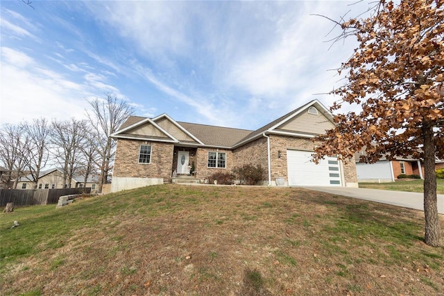 311 Dana Renee, Rolla, MO 65401 - view of front of property featuring concrete driveway, brick siding, and a garage