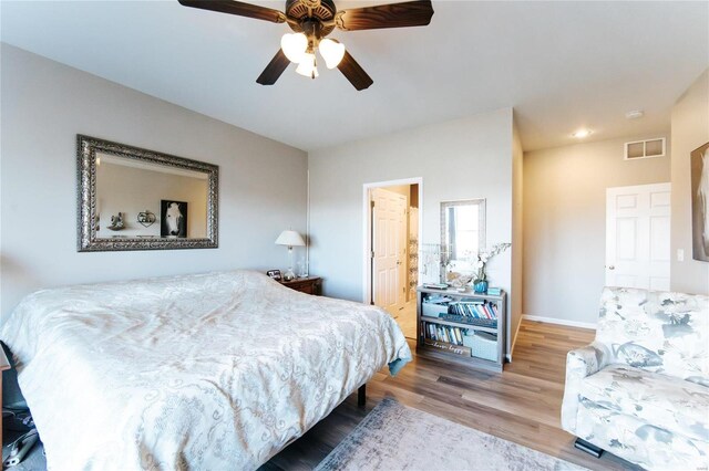 311 Dana Renee, Rolla, MO 65401 - bedroom featuring wood finished floors, baseboards, a ceiling fan, and recessed lighting