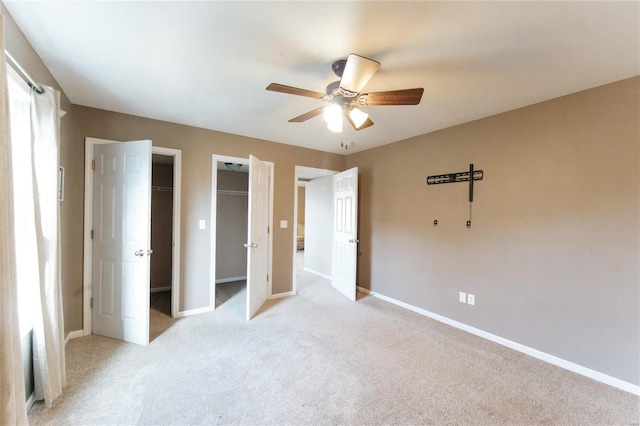 311 Dana Renee, Rolla, MO 65401 - unfurnished bedroom with light colored carpet, baseboards, and ceiling fan