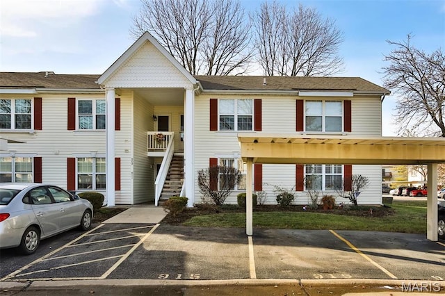 915 Sugar Lake Ct Unit 4, Saint Peters, MO 63376 - townhome / multi-family property featuring uncovered parking and stairway